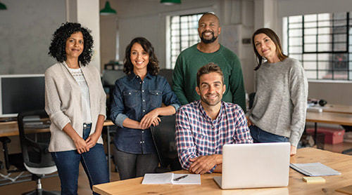 Group of multiracial professional inside the office photo